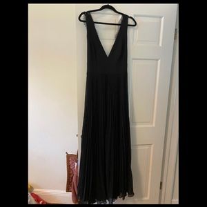 Black gown with open back lace details